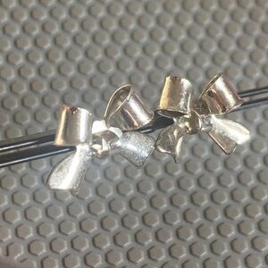 Bow tie silver earrings